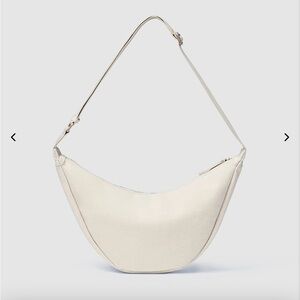 JULY everyday crescent bag in natural color new without tags